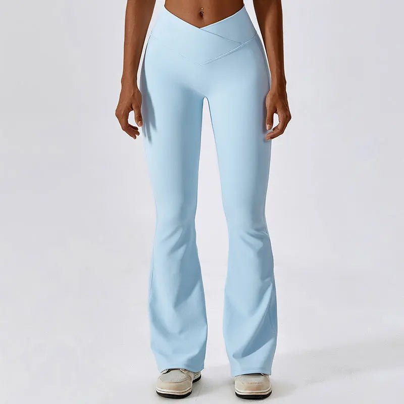 Light blue flared yoga pants with a high-waisted, cross-over design.