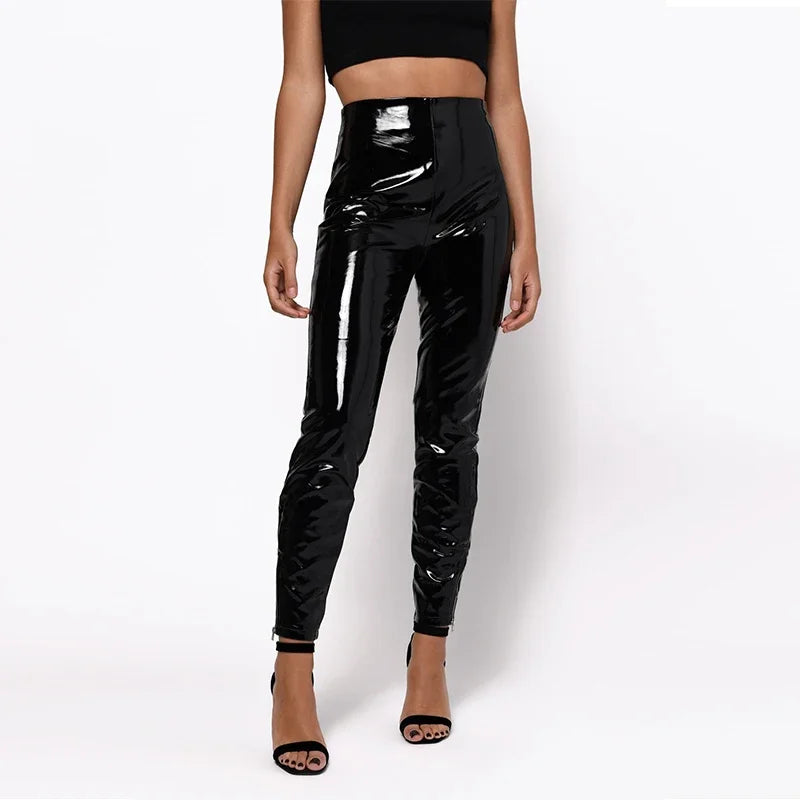 Shiny black high-waisted latex or vinyl pants paired with strappy heels.