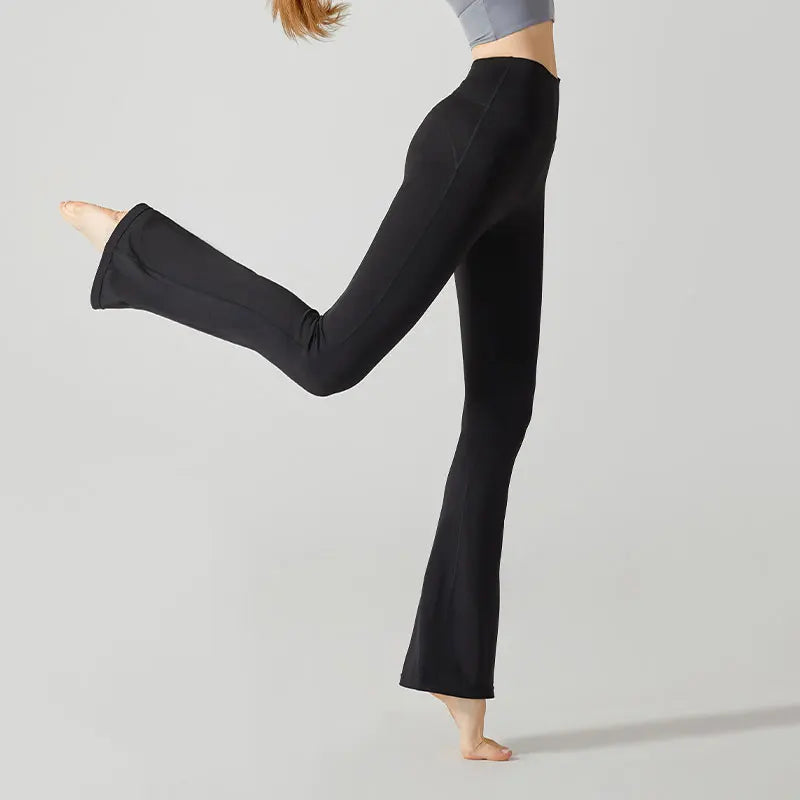 Black yoga pants or leggings with flared legs.