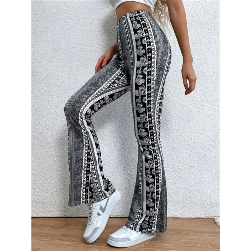 Patterned flared pants with a black and white vertical striped design.