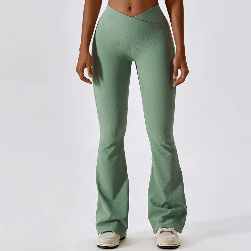 Mint green flared yoga pants or leggings with a high waistband.