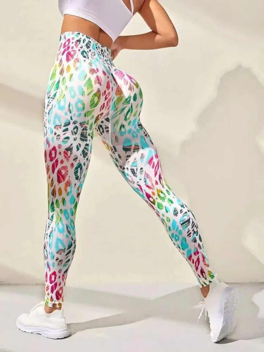 Colorful patterned leggings with a vibrant animal print design.