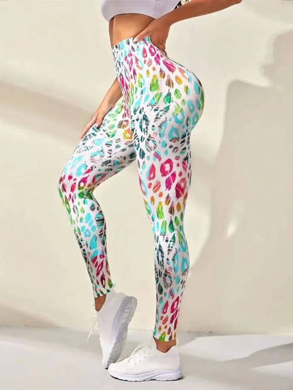 Colorful patterned leggings with a vibrant animal print design.