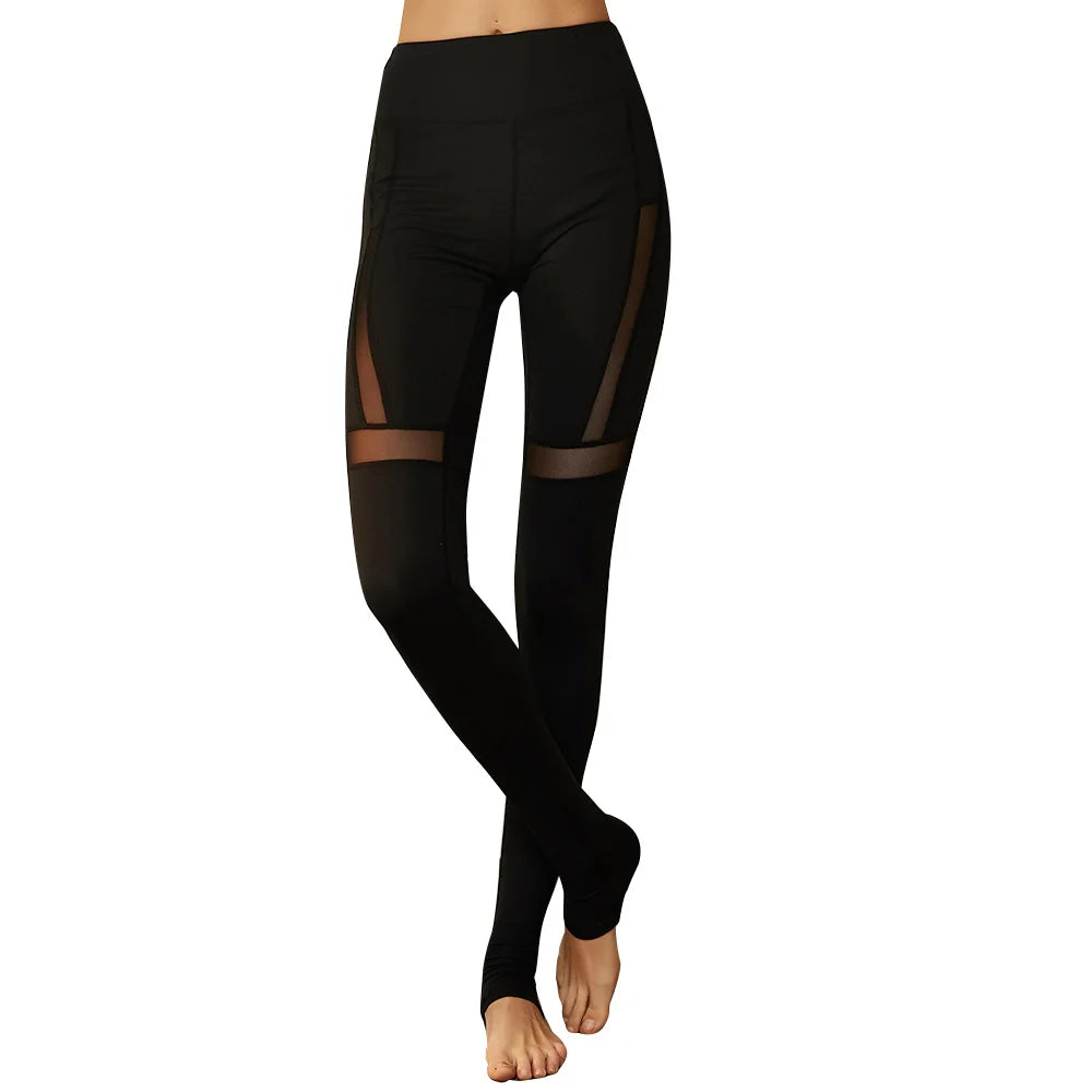 Black leggings with sheer mesh panels on the thighs.