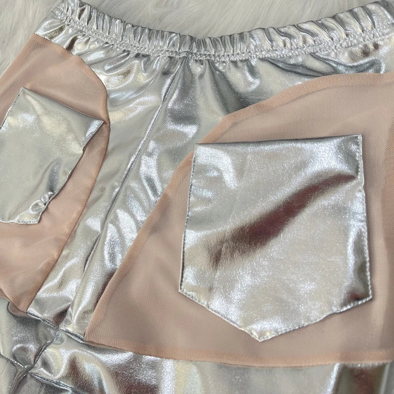 Shiny silver shorts or underwear with mesh or sheer panels.