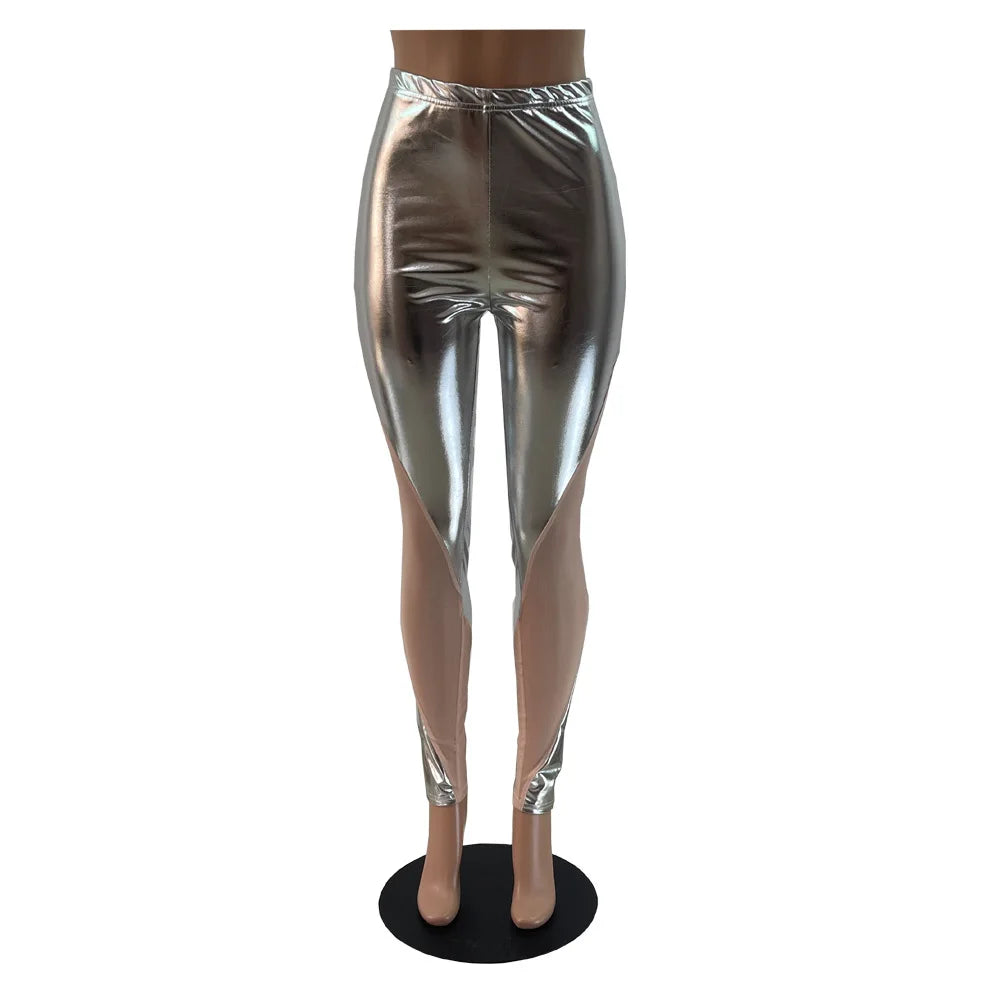 Shiny silver metallic leggings or pants on a mannequin stand.