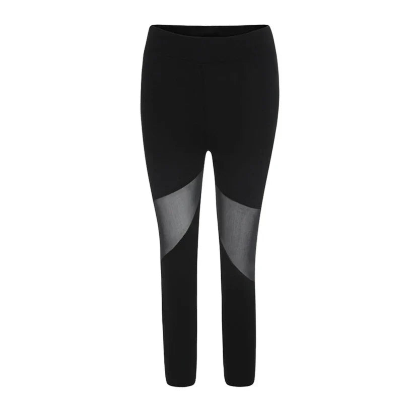 Black leggings with sheer mesh panels on the thighs.