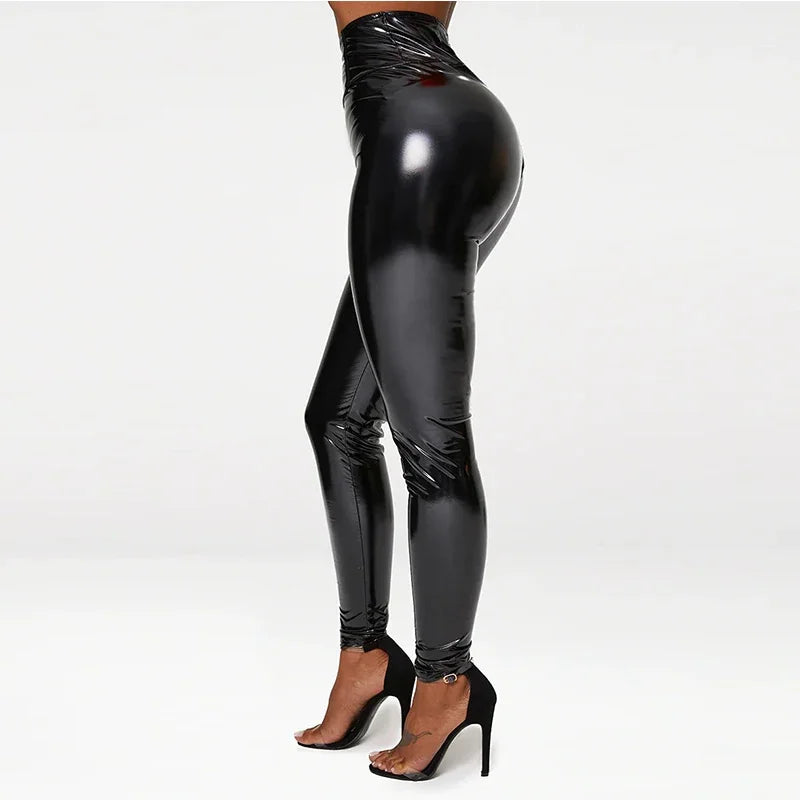 Shiny black latex or faux leather leggings worn with high heels.